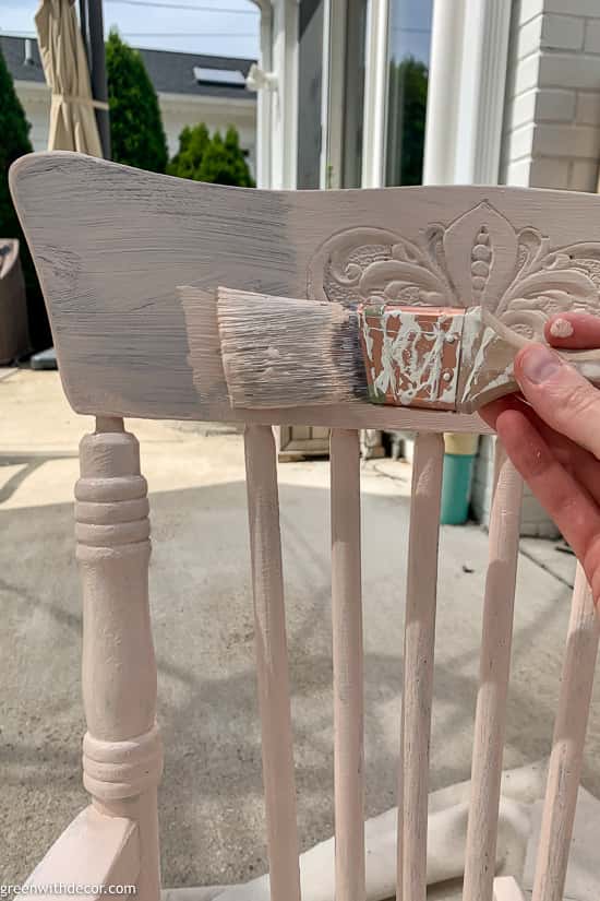 Second coat painting a chair