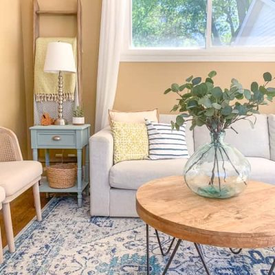Ladder blanket storage in coastal family room