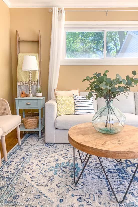Ladder blanket storage in coastal family room