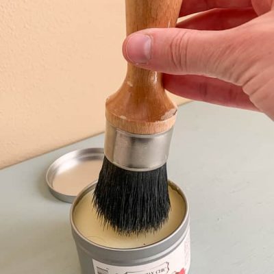 Wax brush swirling in wax container