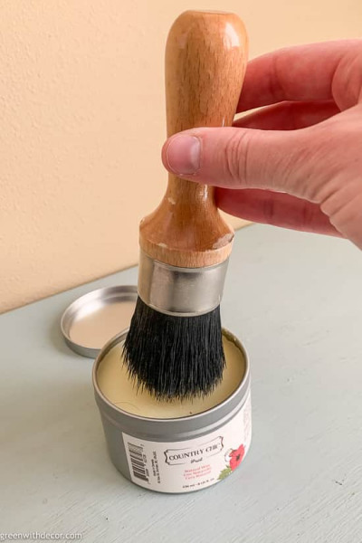 Wax brush swirling in wax container