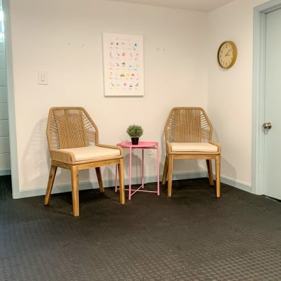 Basement playroom with coastal chairs